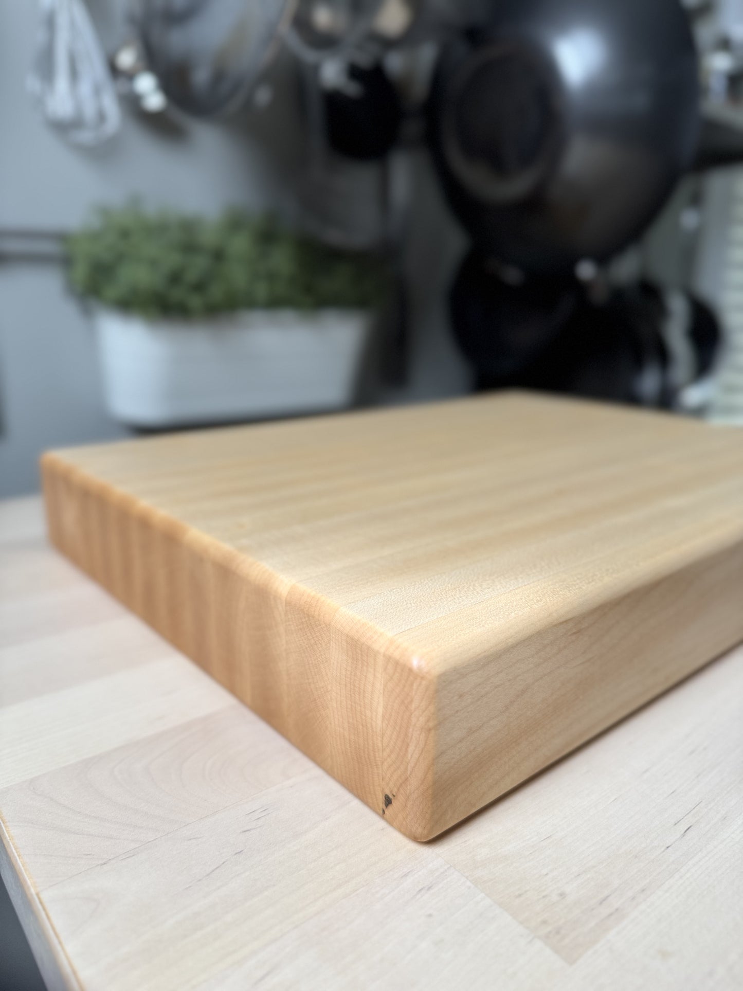 Side view of BASTION butcher block, highlighting its thick 2.25-inch durable construction.