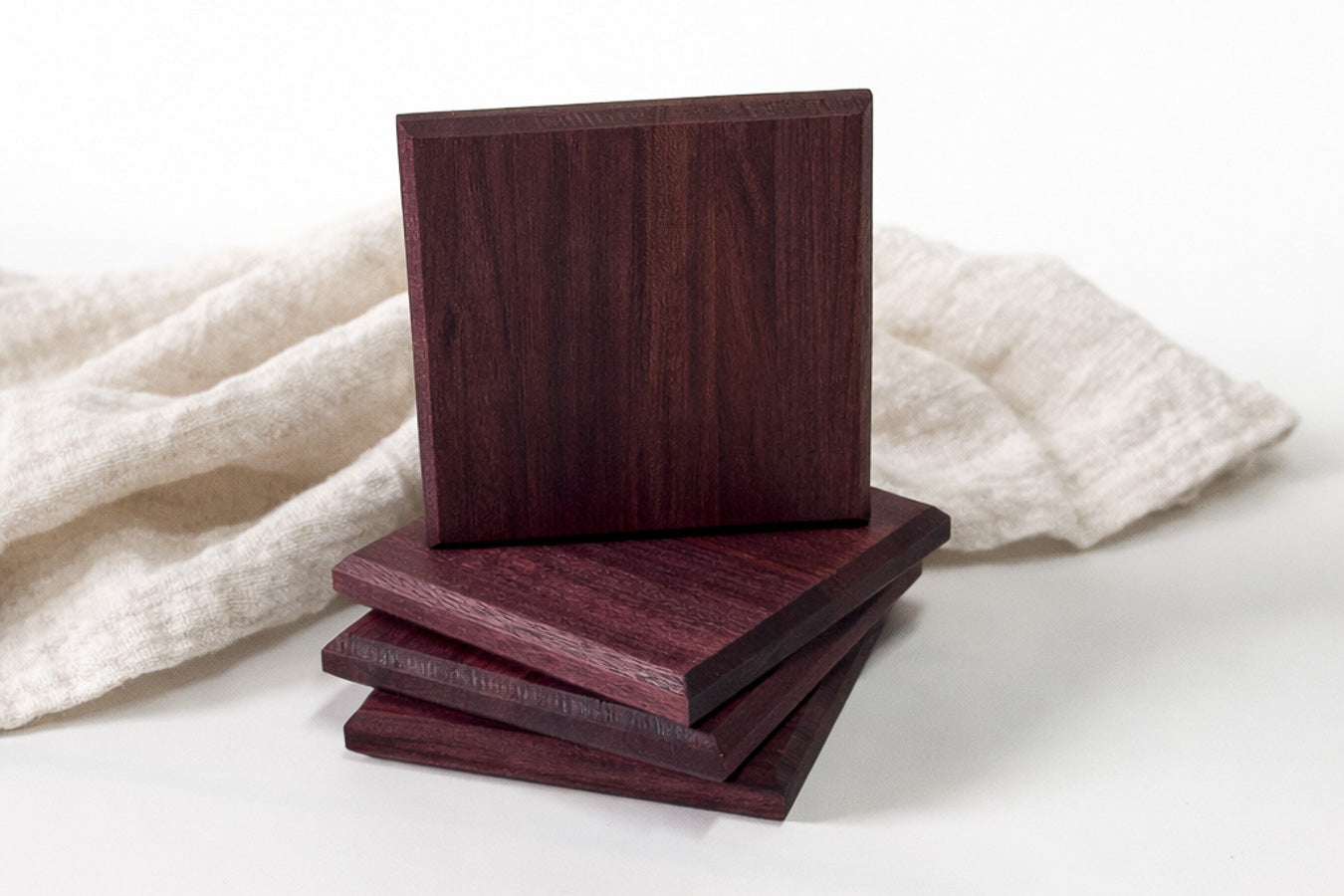 Purpleheart wood coaster handmade in Ottawa, vibrant purple exotic hardwood close up zoomed in