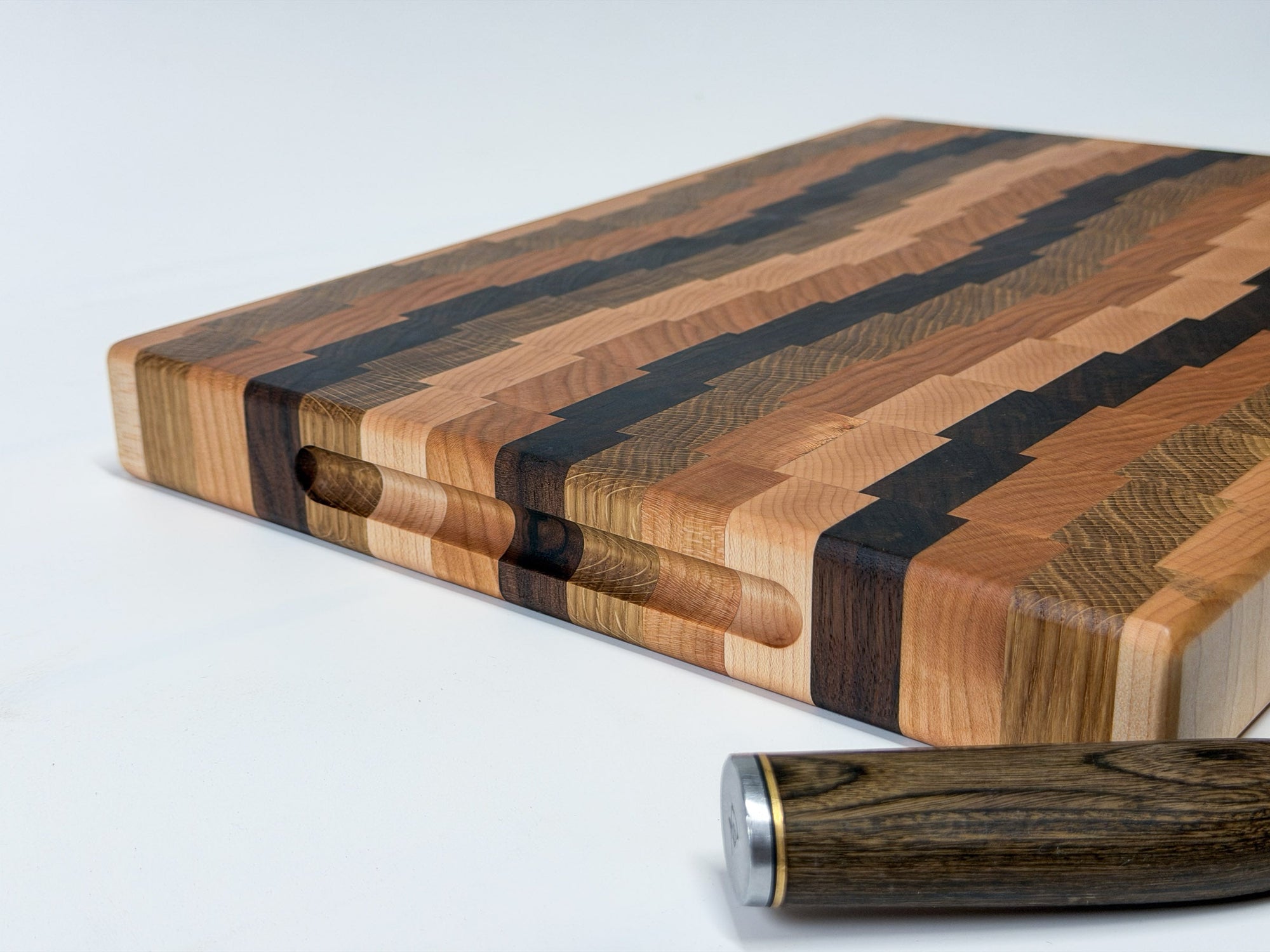 Top down view of end grain butcher block handmade in Ottawa, mixed hardwood grain pattern