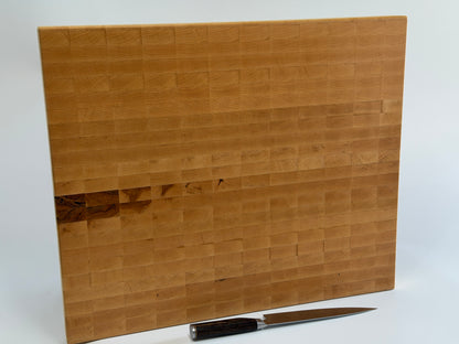 Close-up of maple end grain cutting board surface — handcrafted hardwood butcher block