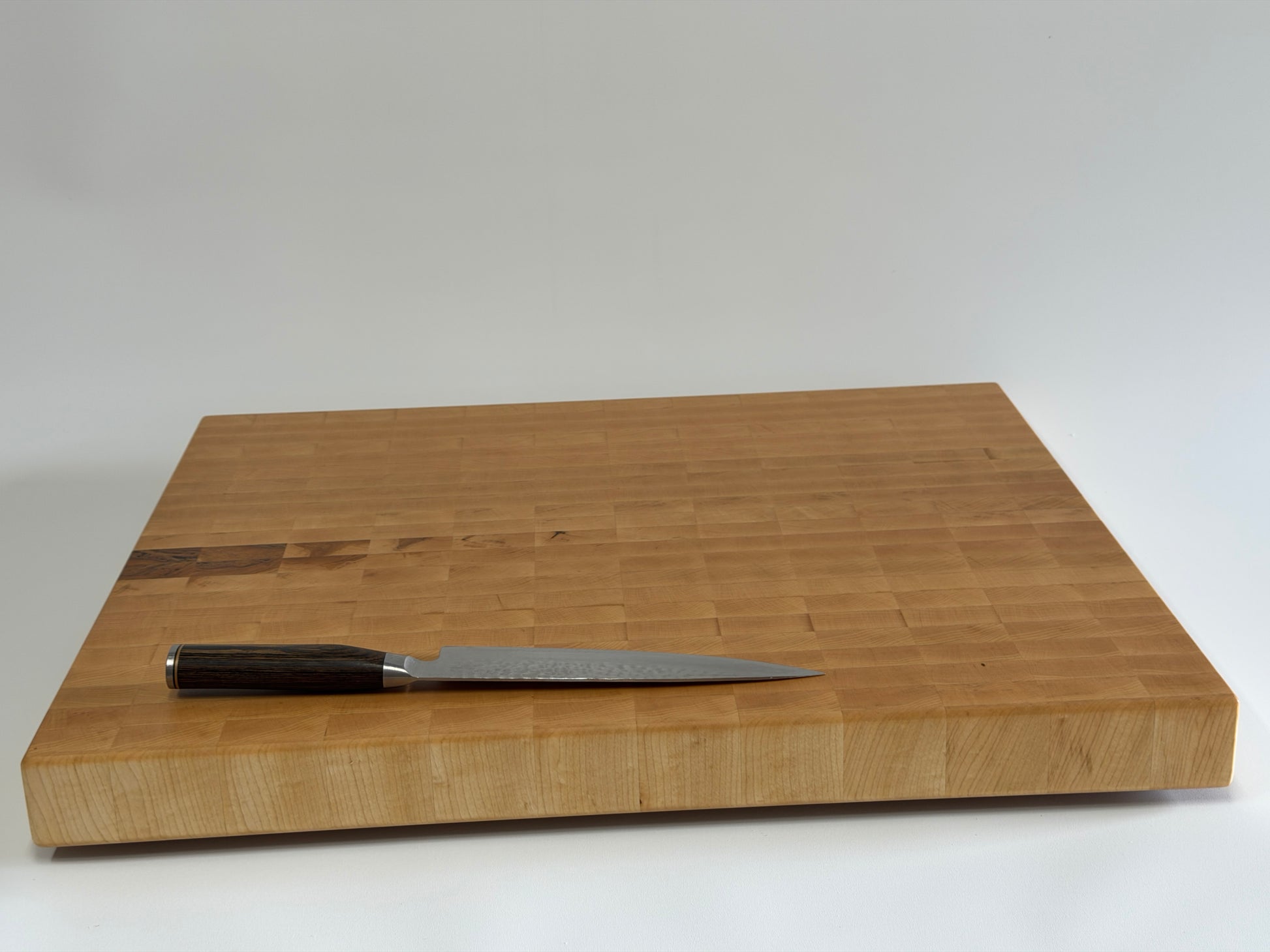 Side profile of 2-inch thick maple end grain butcher block — custom cutting board Ottawa