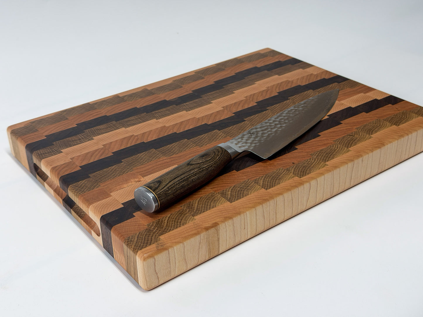 Side profile of end grain butcher block showing hardwood thickness, handmade Ottawa
