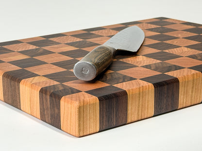 Top down view of end grain butcher block surface showing mixed hardwood end grain pattern, Ottawa Lumber Bin