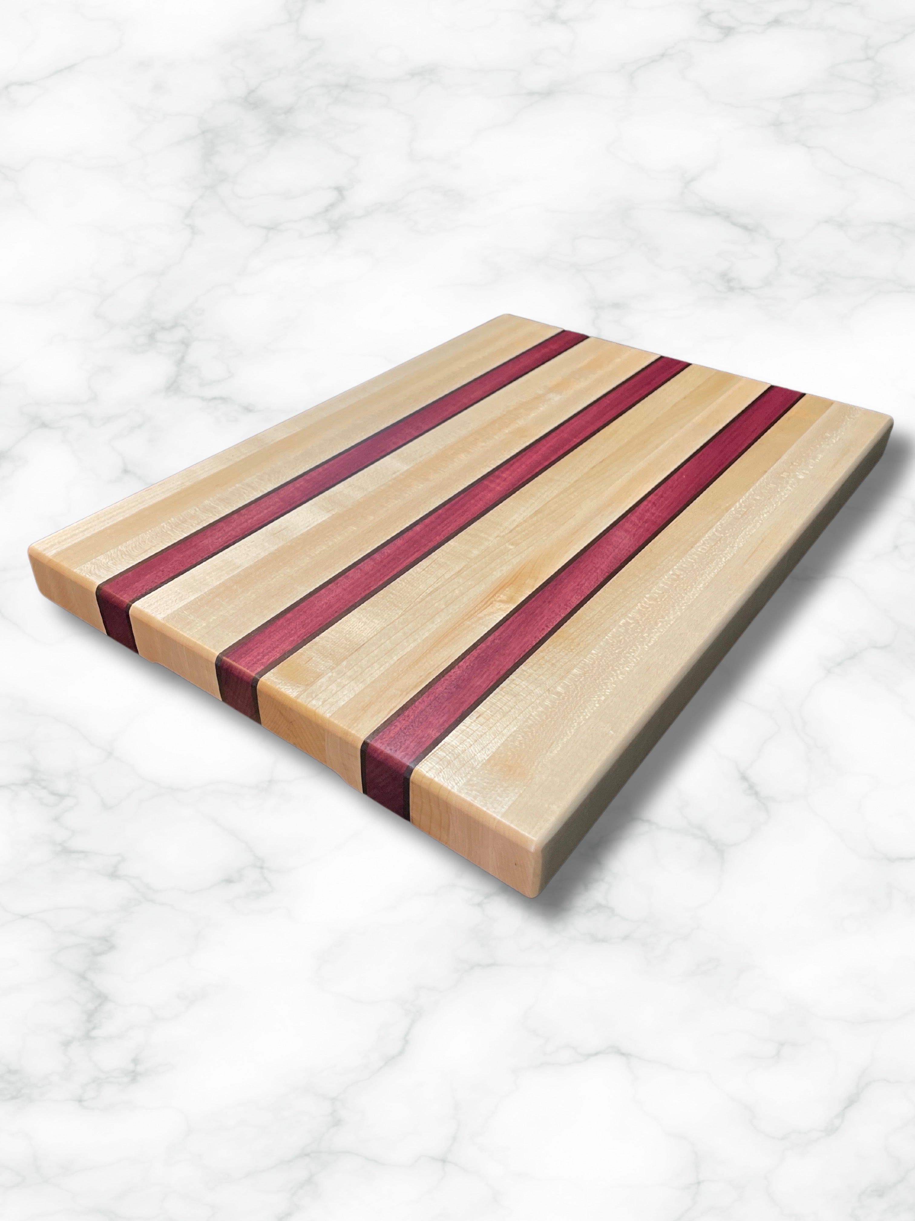 custom handmade edge grain maple purpleheart walnut wood cutting board, side view