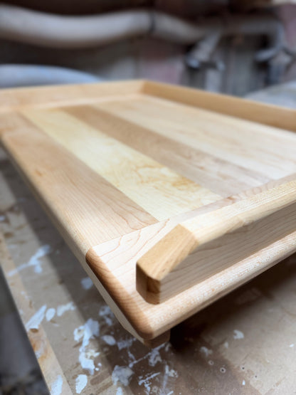 Zoomed front view of maple pierogi board showing grain and surface detail
