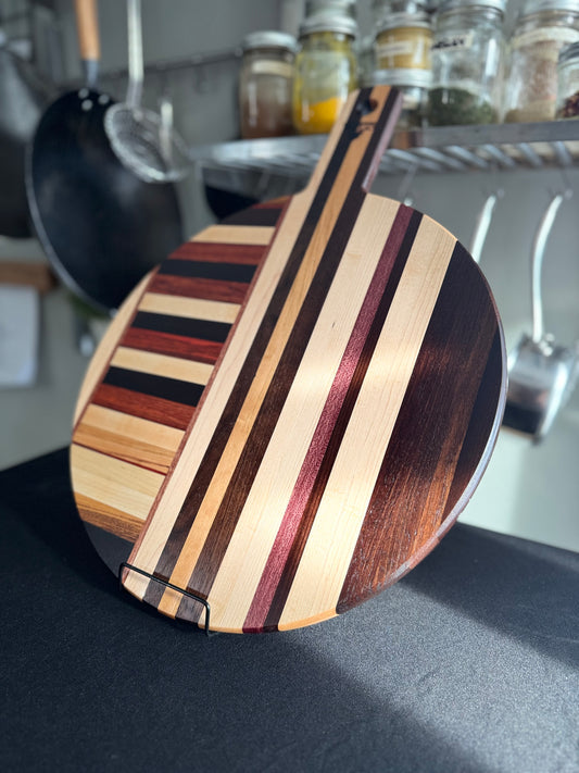 Handcrafted round hardwood pizza board made from mixed wood offcuts — Elora by Ottawa Lumber Bin