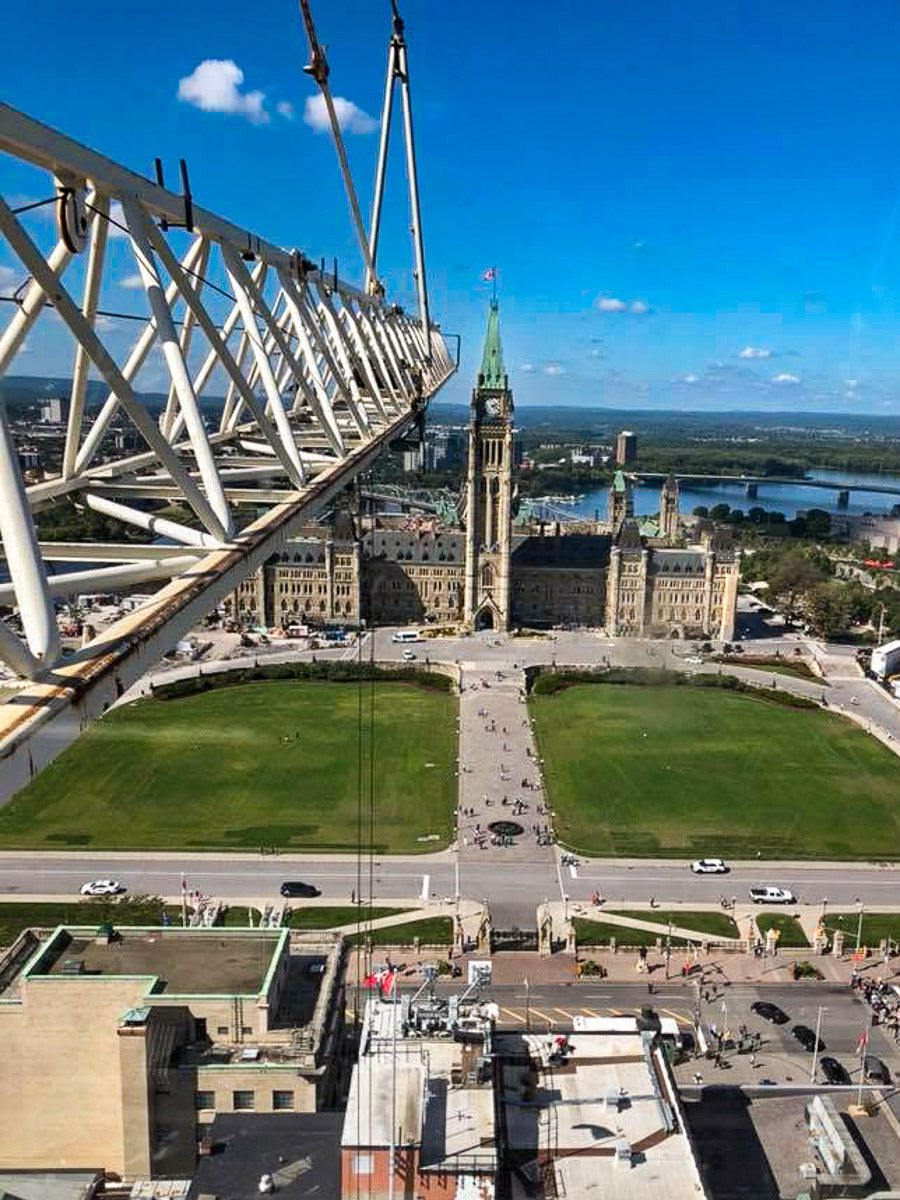 View of Parliament Hill from a tower crane in downtown Ottawa, reflecting the founder's career before starting Ottawa Lumber Bin.
